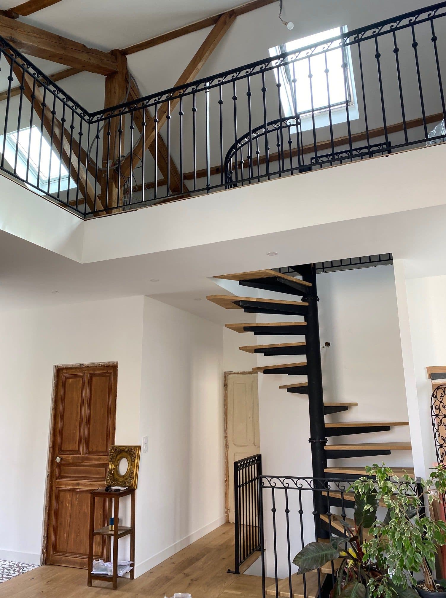 Garde-corps en inox brossé sur palier d'escalier
